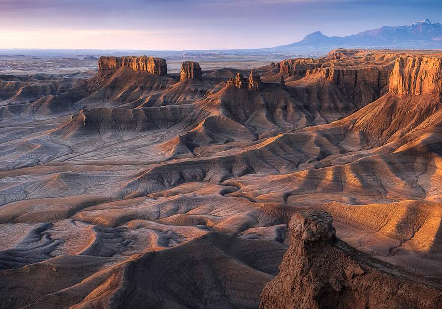 As the sun rises in Capitol Reef country, the stars dissipate but the stunning landscape takes hold.