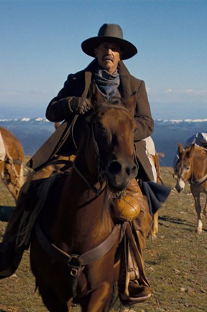 Kevin Costner rides a horse across a Southern Utah mountain range in the film, "Horizon: An American Saga."