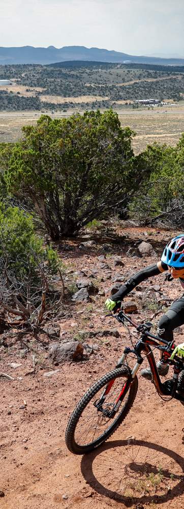 Mountain biker riding the Lichen It Trail near Cedar City.